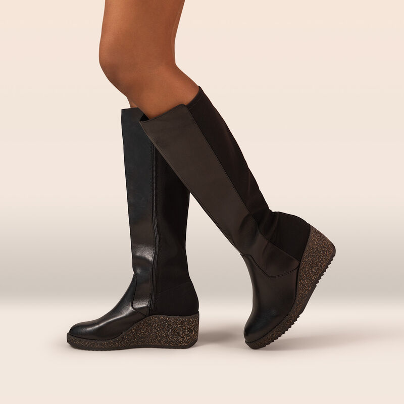 black wedge calf boot on foot
